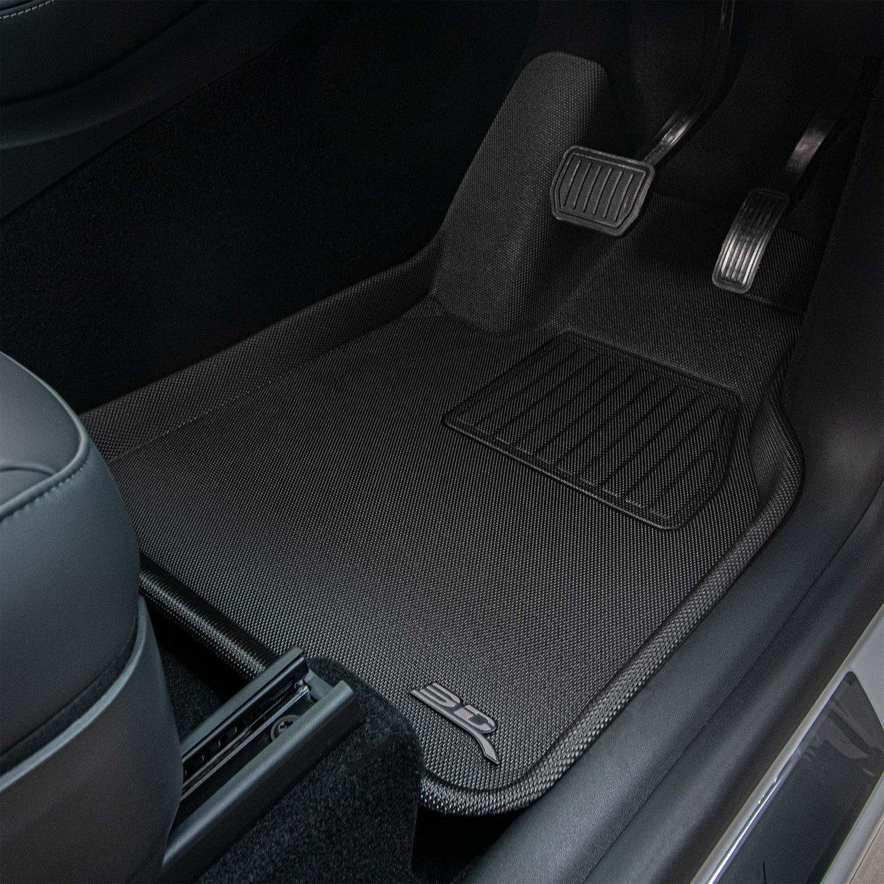 Floor liner fitted in Tesla Model Y front footwell - 3D MAXpider - Revzone