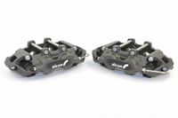Alcon caliper pair on white background