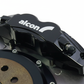 Black Alcon brake caliper on rotor
