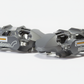 Pair of grey Alcon brake calipers with spec label