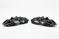 Two Alcon TA6+ callipers - bright white background